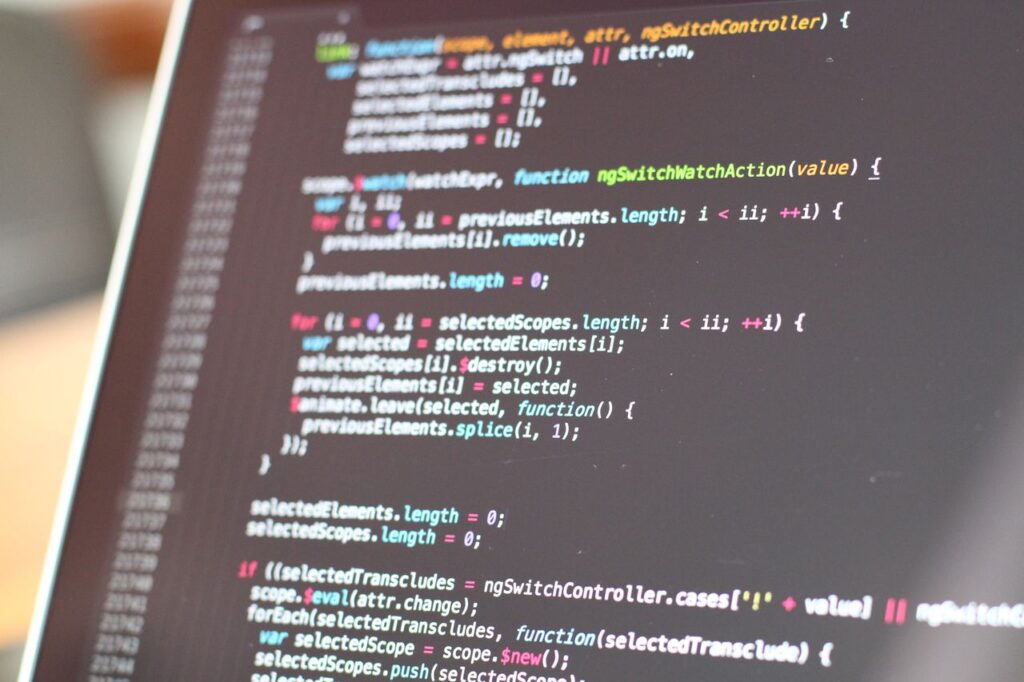 Crafting Captivating Headlines: Your awesome post title goes here Close-up view of colorful code on a laptop screen, showcasing programming concepts.